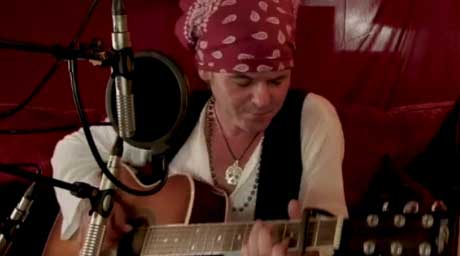 Spike playing guitar